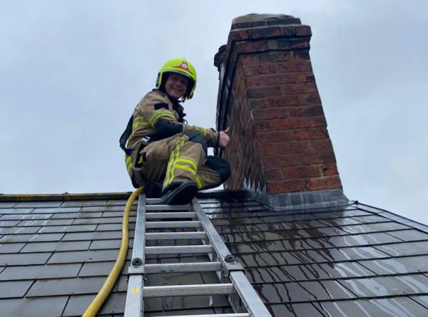 Firefighter Brave Dave gives a thumbs up after putting out a chimney fire